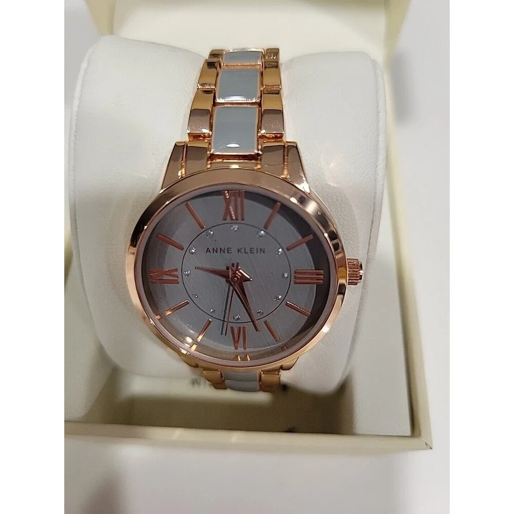Anne Klein Women's Rose Gold-Tone and Light Pink Resin Bracelet Watch